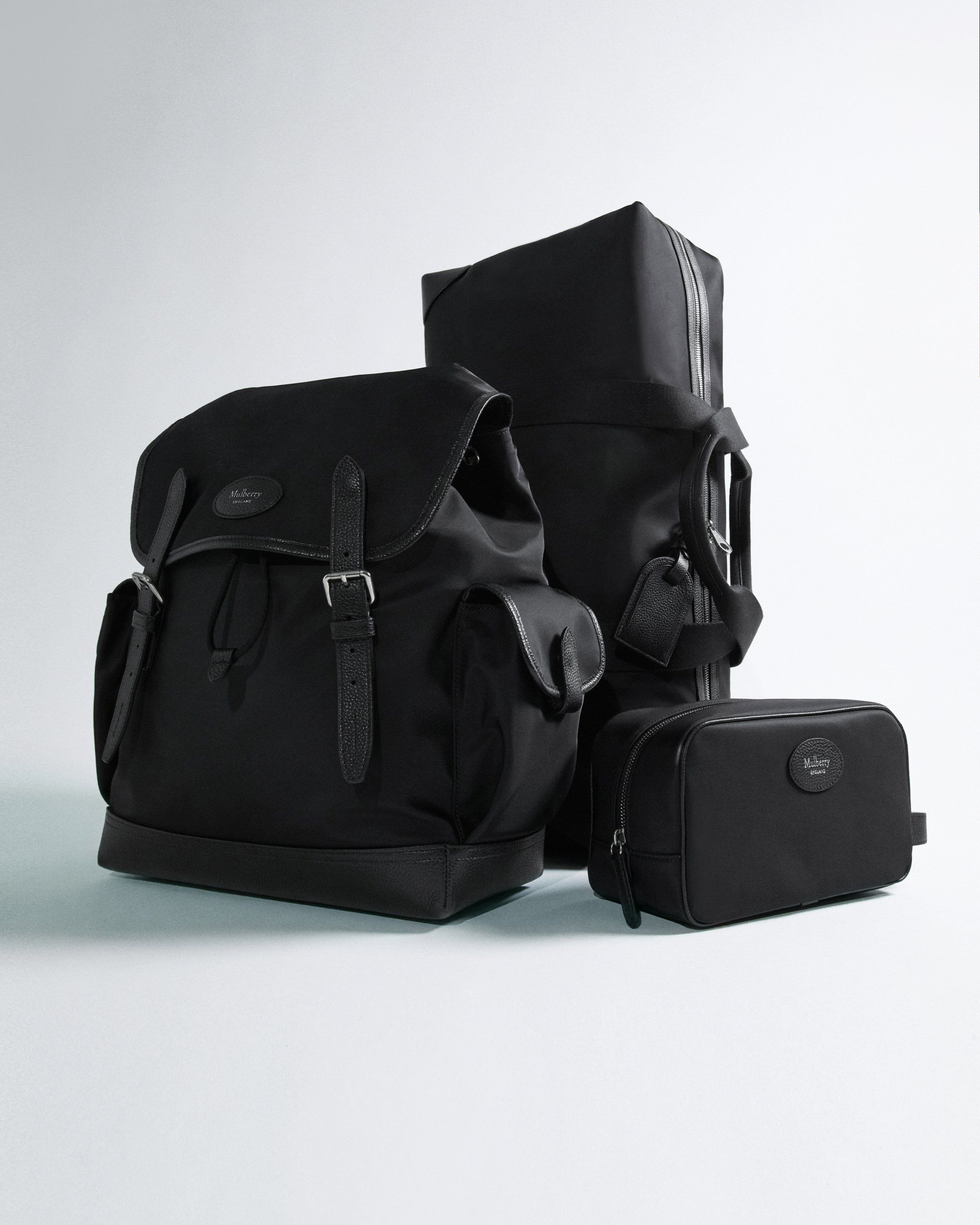Group of Mulberry Nylon Heritage Backpack, Nylon Clipper and nylon wash case in black